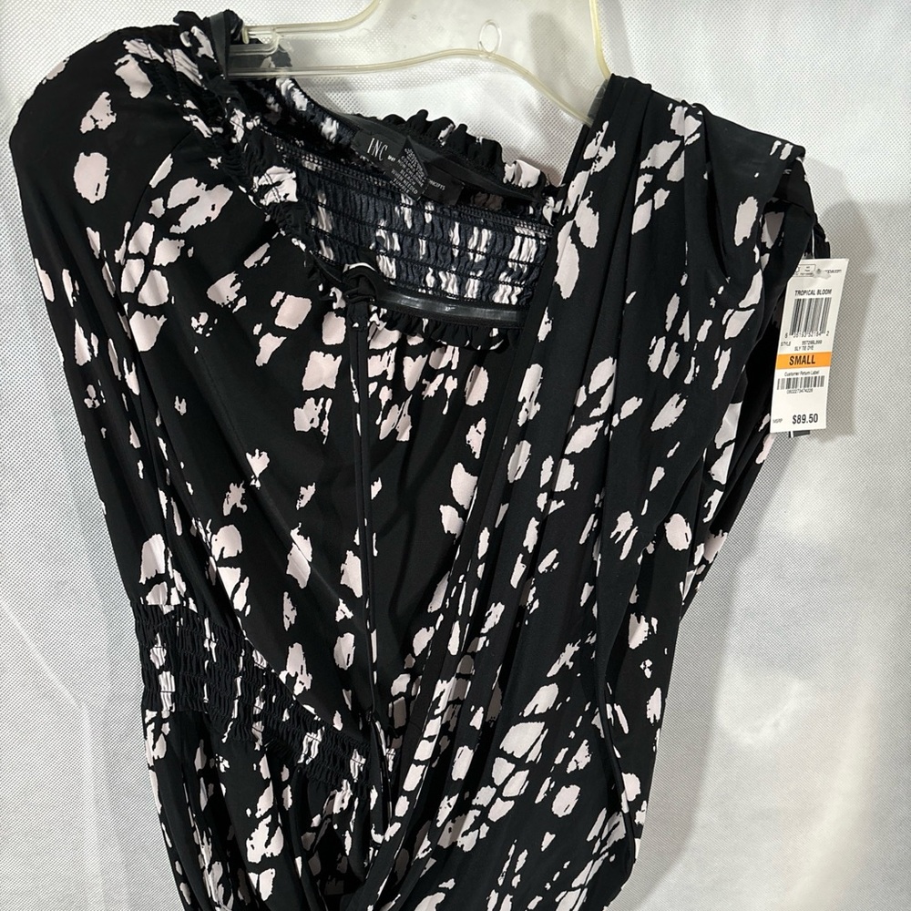 Jumpsuit INC. Size small. Tie dye. Regular fit. A sleek fit tailored